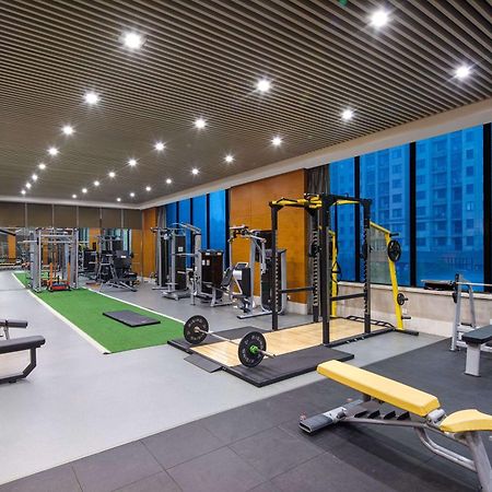 Отель Wyndham Xinyang Downtown Экстерьер фото
