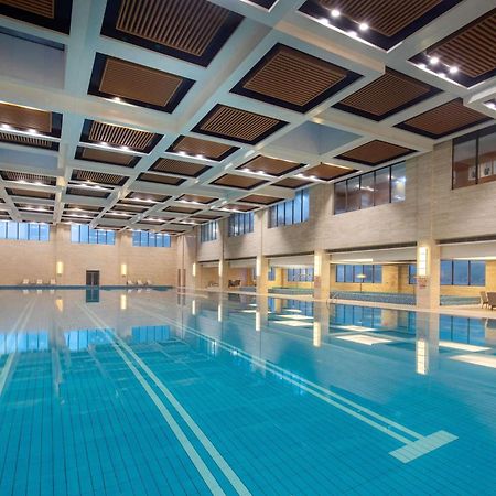 Отель Wyndham Xinyang Downtown Экстерьер фото