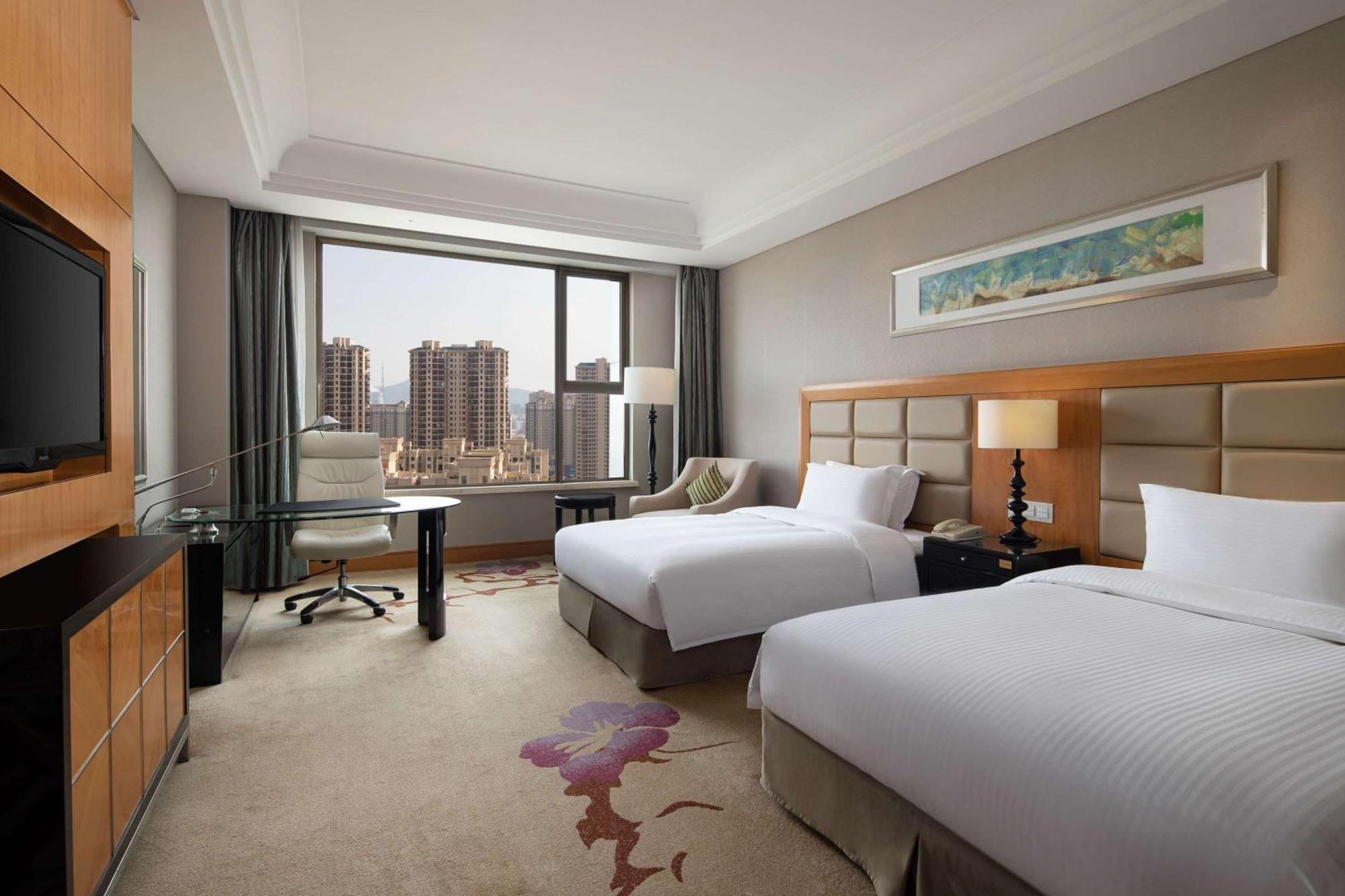 Отель Wyndham Xinyang Downtown Экстерьер фото